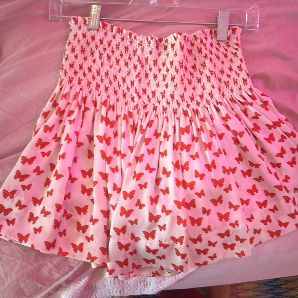 White with red butterfly mini skirt from shop Koch.
